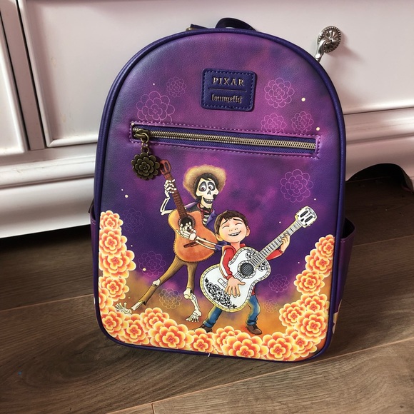 Loungefly Handbags - Loungefly Coco Backpack